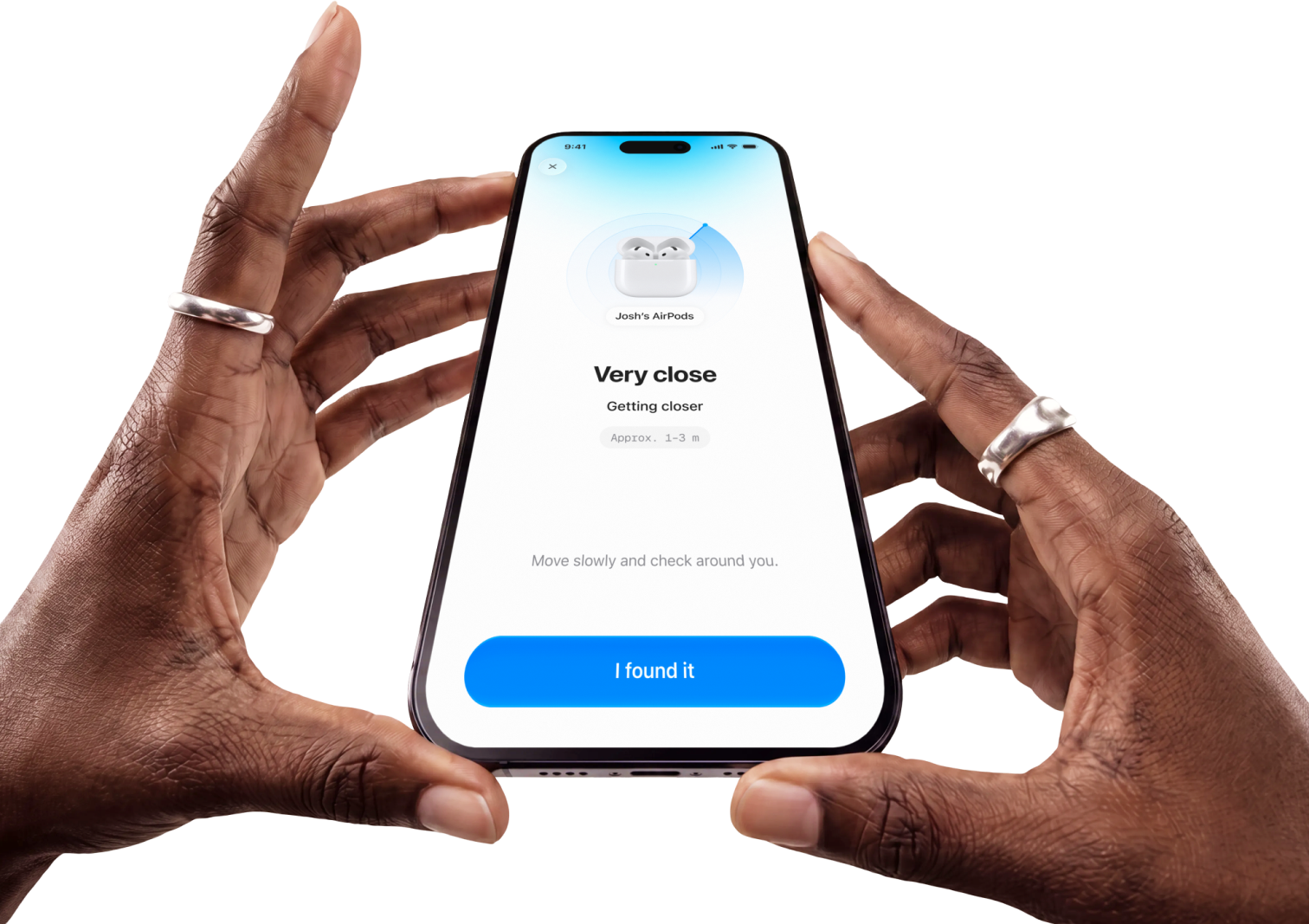 Two hands holding an iPhone running Findr, showing Josh’s AirPods as very close
